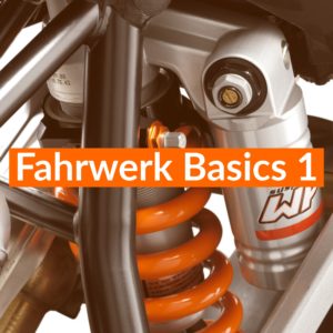 Detailaufnahme eines KTM-Fahrwerks mit orangefarbener Feder und Dämpfer für Motorrad-Enthusiasten.